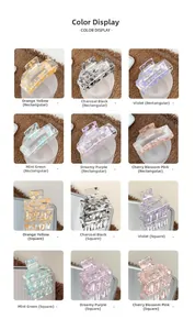 Color display of geometric acrylic hair claws with floral patterns in various shades