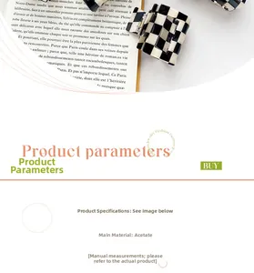 Detail of large checkered acetate hair claw clip on French book with pearl decor