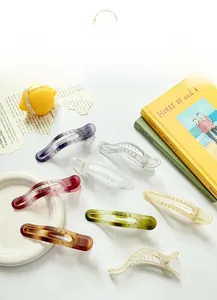 Variety of gradient matte resin hair claws in diverse colors and hollowed-out shapes