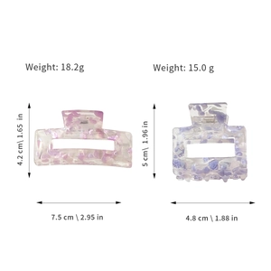 Acrylic hair claw clips in pink and purple marble texture with size and weight specs