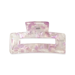 Rectangular acrylic hair claw clip with purple resin fragments on a white background