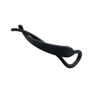 Minimalist matte black banana hair clip with elegant twisted design on a white background