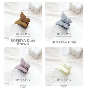 Pinces à cheveux papillon mates en marron foncé, gris, violet et blanc élégant