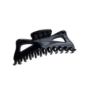 Pince à cheveux 14cm noir brillant avec cadre évidé pour chignons élégants