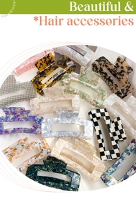 Macro display of assorted 13cm checkered and marble pattern acetate hair claw clips