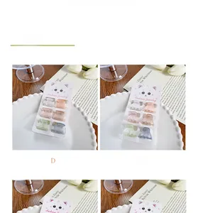 Vue détaillée de 6 pinces à cheveux papillon mates pastel sur carte de présentation