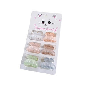 Lot de 6 pinces à cheveux papillon en résine mate aux couleurs pastel sur carte