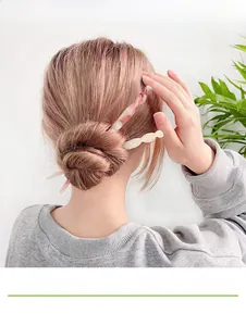 Modern acetate hair fork sticks in pink and beige marble patterns for bun hairstyles