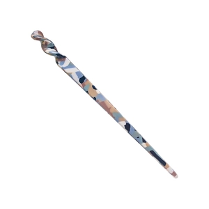 Modern tortoiseshell acetate hair stick with unique colorful marble pattern and spiral top