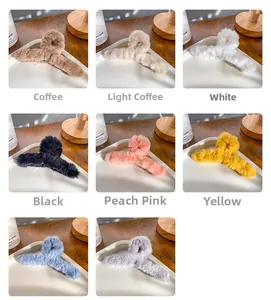 Detail showcasing variety of large plush hair claws in multiple soft autumn colors