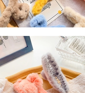 Detail of plush faux fur hair claws in pastel colors with strong spring mechanism