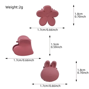 Mini bean paste pink hair claws set featuring flower, heart, and rabbit matte designs