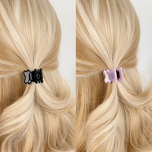 Pinces à cheveux en acétate en noir et lavande pour une coiffure élégante et chic