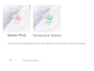 Macro shot of light pink and cyan green acetic acid flower-shaped hair claw clips