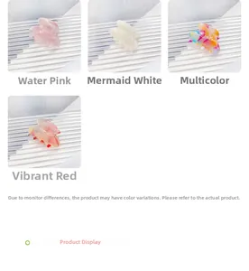 Close-up of small acetate hair claws in pastel pink, pearl white, and vibrant colorful patterns