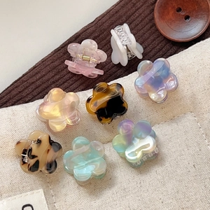 Set of 8 colorful flower shaped acetate hair claws for women in sweet pastel colors