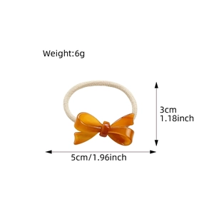 Translucent amber acetate bow hair tie with high elastic cream braided band