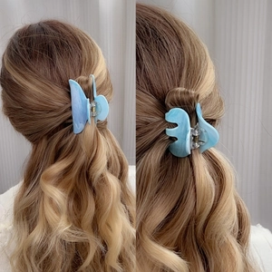 Blue marble acrylic hair claw clip for lazy style half-up hairstyle on long wavy hair