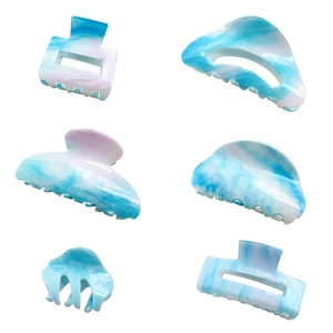 Sky blue marble acrylic hair claw set with six geometric shapes and watercolor pattern
