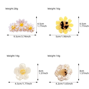 Floral hair claw clips set including daisy designs and marble texture acetate shark clips