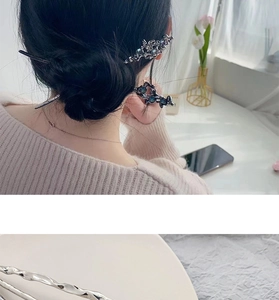 Vue détaillée d'une épingle à cheveux argentée style lave avec texture métallique fluide