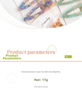 Detailed close-up of cat-shaped acetate hair clips with marble texture and dimensions