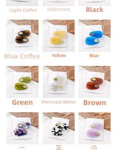 Close-up of various colorful acetate hair clips on display cards in multiple patterns