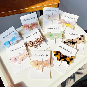 French vintage dachshund dog hair clip set in colorful acetate with sparkling rhinestones