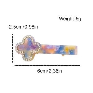 Purple marble clover hair clip with rhinestones and measurement annotations