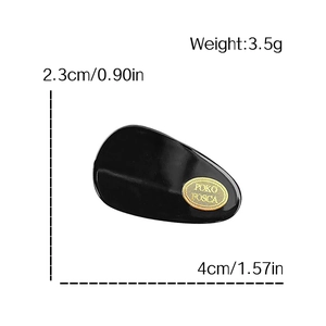Minimalist black acetate teardrop hair clip with gold metal oval accent and 4cm length