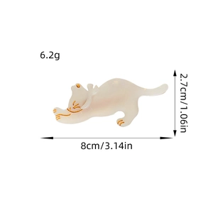 Vintage cat hair clip with mother-of-pearl texture and dimensions 8cm by 2.7cm