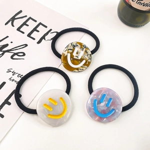 Three-piece acetate smile face hair ties set with high-elasticity black rubber bands