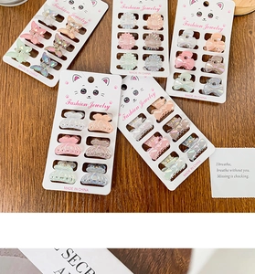 Lot de 6 mini pinces à cheveux nacrées aux formes de papillon et de fleur sucrées