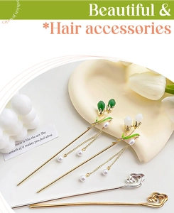Detail of Chinese style hairpins with lily of the valley flowers and pearl tassels