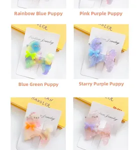 Detailed close-up of poodle acetate hair clips in multiple marbleized color variations