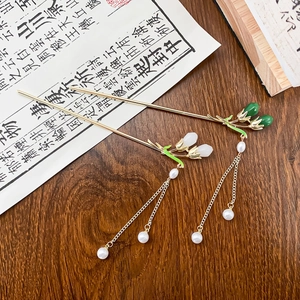 Traditional Chinese gold metal hairpins with pearl tassels and enamel flower buds