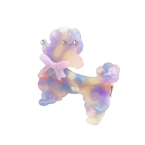 Elegant acetate poodle dog hair clip with marble texture and rhinestones on white base