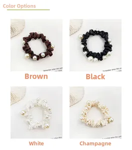 Detailed set of four satin scrunchies with faux pearls in brown, black, white, and beige