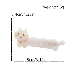 Acetaat kattenhaarklem met parels en strass steentjes, maat 8cm bij 3.4cm