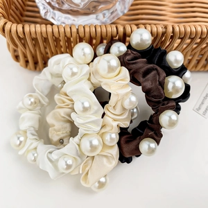 Three-piece elegant satin hair scrunchies set with pearls in white, beige, and brown black