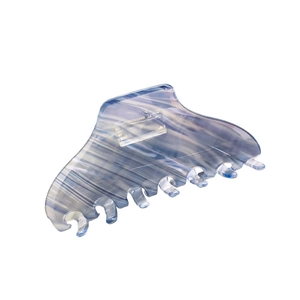 Large blue marble acetate hair claw clip for thick hair styling in minimalist design