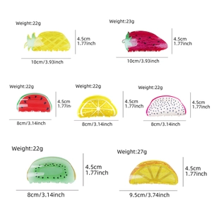 Fruit shaped acrylic hair claws including pineapple strawberry and lemon designs