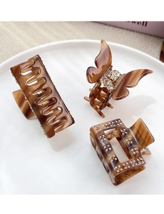 Three-piece set of tortoiseshell acetate hair claws in butterfly and rectangular shapes