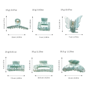 Lot de pinces à cheveux en acétate bleu clair marbré avec des strass étincelants