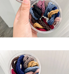 Detailed macro view of honeycomb texture multi-color elastic hair ties in a clear container