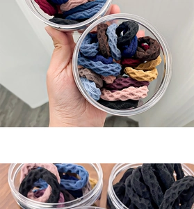 Close-up of high-elastic wave hair ties in Morandi colors with transparent storage box