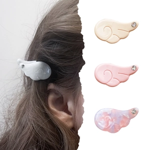 Angel wing acetate hair clips for girls with sparkling rhinestone details and marbled finish
