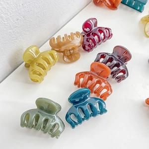 Pinces à cheveux colorées en résine brillante pour queues de cheval hautes et coiffures tressées