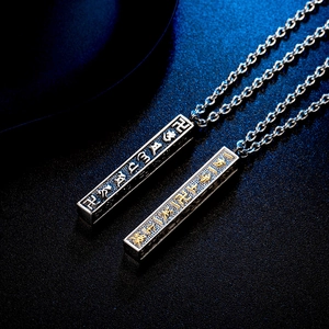 Vintage 18K gold plated Buddhist mantra pendant necklace with engraved script and charms