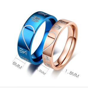 Detailed view of couple rings showing dimensions and artistic Chinese engravings